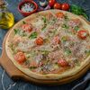 С пармской ветчиной и рукколой в Trattoria по цене 940