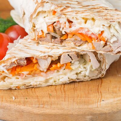 Шаурма Гигант со свининойв Мангал хаус по цене 580 ₽