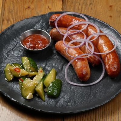 Ассорти колбас с аджикой и битыми огурцами в Brasserie Kriek по цене 1590 ₽