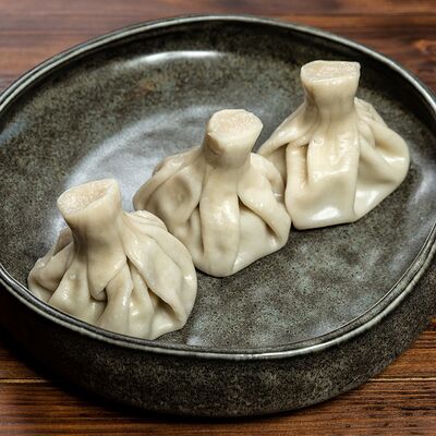 Хинкали с говядиной и свининой в Трактир Колесо по цене 396 ₽