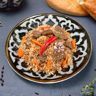 Плов Чайханский в Чинар по цене 530 ₽