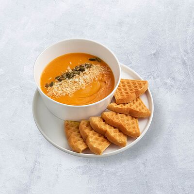 Тыквенный крем-суп с пармезаном и вафлей в VAFFEL по цене 380 ₽
