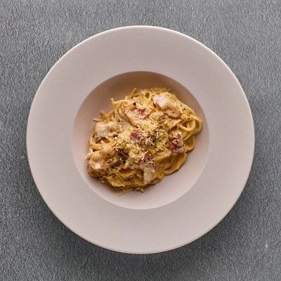Спагетти Карбонара в Camorra Isola Grande по цене 700 ₽