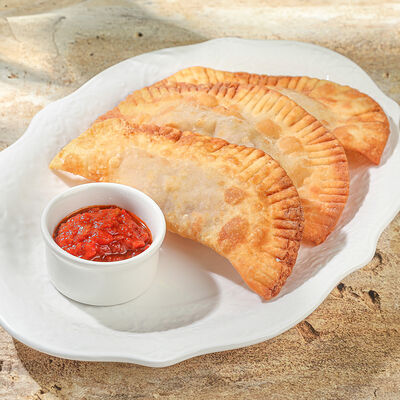 Мини-чебуреки со свининой и говядиной в Ива по цене 640 ₽