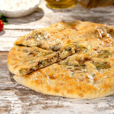 Сыр с листьями свёклы 450 г в Пиросетия Осетинские пироги по цене 530 ₽