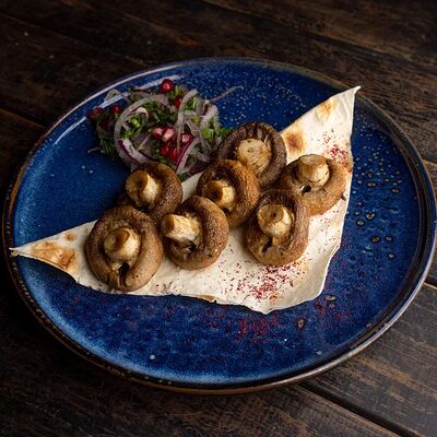 Шампиньоны на мангале в LuckyDze по цене 490 ₽