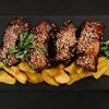 Свиные ребрышки BBQ c картофелем по-деревенски в Фабрика Вкуса по цене 550