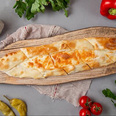 Пиде с тремя видами сыра в Куркума по цене 730 ₽