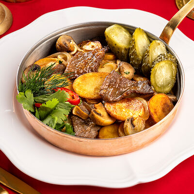 Жареная картошка с телятиной в Урюк по цене 890 ₽