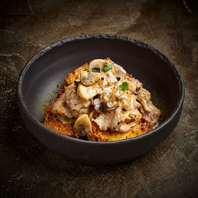 Свинина по-фермерски с драниками в Корчма по цене 690 ₽