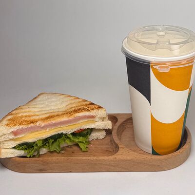 Кофе, сэндвич с ветчиной и сыромв Do.bro coffee по цене 850 ₽