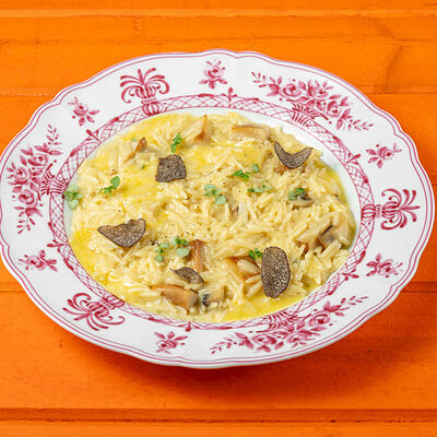 Орзо с белыми грибами и трюфелем в Сорренто by Novikov по цене 890 ₽