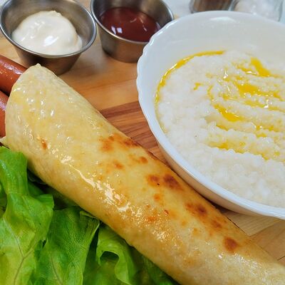 Рисовая каша с сосисками в лаваше в Вкусно как дома по цене 499 ₽