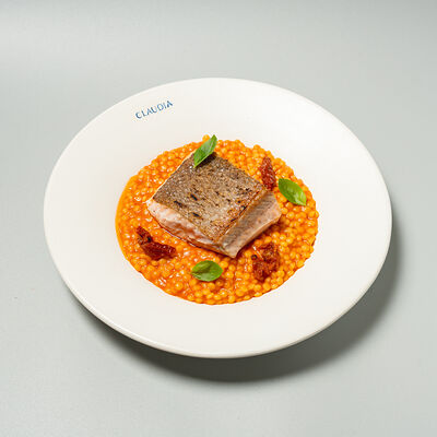 Форель, фрегола, вяленые томаты в Claudia по цене 1950 ₽