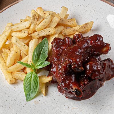 Свиные ребрышки в остром соусе BBQ в Adriano Leonardo по цене 1188 ₽