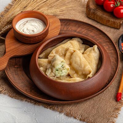Вареники с сыром и зеленью в Русская кухня по цене 650 ₽
