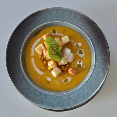 Тыквенный крем-суп с молодой моцареллой в Bucho по цене 350 ₽