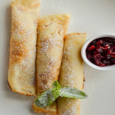 Блины с творогом в Тревеллерс кофе по цене 409 ₽