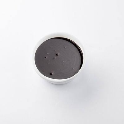 Шоколадный соус в Udcкафе Upside Down Cake по цене 50 ₽