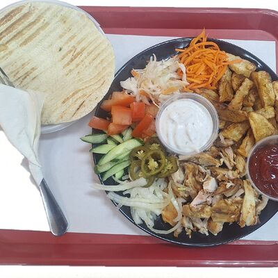 На тарелке XXL в СПб Шаверма по цене 750 ₽