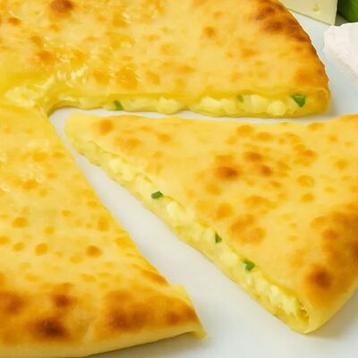 Пирог с сыром и зелёным луком в Алпироги по цене 990 ₽