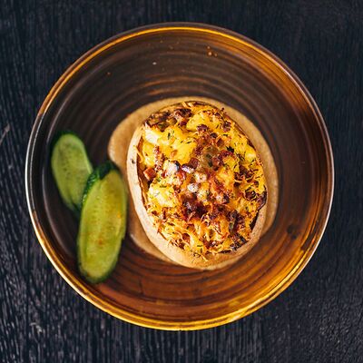 Печеный картофель с говяжьей грудинкой в Carne grill по цене 330 ₽