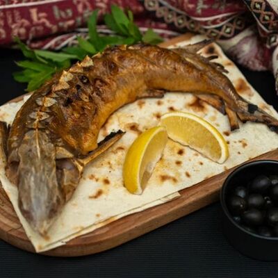 Стерлядка речная на мангале в 17 шампуров по цене 2525 ₽