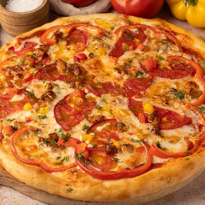 Мясная пицца в Осетинские пироги Баркад по цене 650 ₽