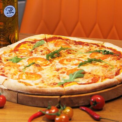 Пицца Маргарита в Foodlink по цене 500 ₽