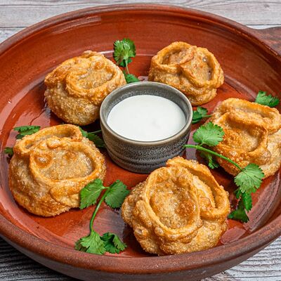 Манты с бараниной жареные в Yunga Tim Fish & Grill по цене 970 ₽