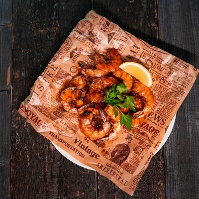 Тигровые креветки жаренные в фирменной заправке в Роллы по себестоимости по цене 699 ₽