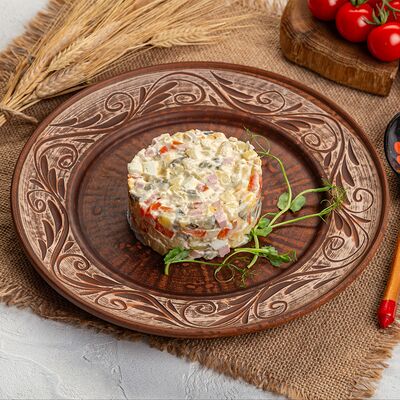 Салат Оливье с колбасой в Русская кухня по цене 480 ₽