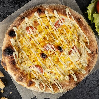 Неаполитанская пицца Цезарь в Пицца и Паста по цене 895 ₽