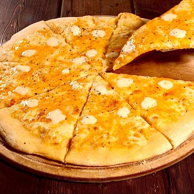 Пицца 4 сыра в Мама-Папа по цене 870 ₽