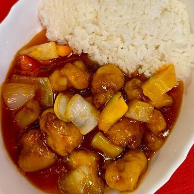 Свинина с ананасами и чесночным рисом в Китайская столовая по цене 569 ₽