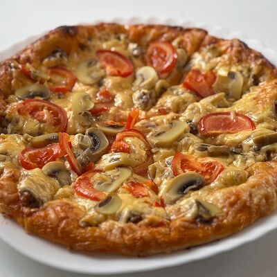 Пицца с мясом в Мубарак по цене 1500 ₽