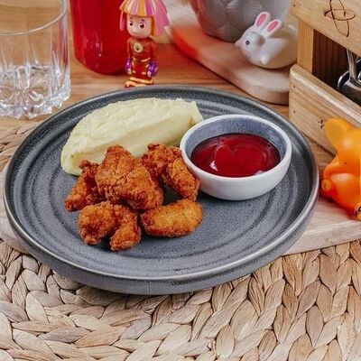 Д* Куриный попкорн с пюре детский в ЭлеКафе по цене 420 ₽