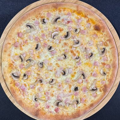 Ветчина-грибы в Boss pizzarolls по цене 770 ₽