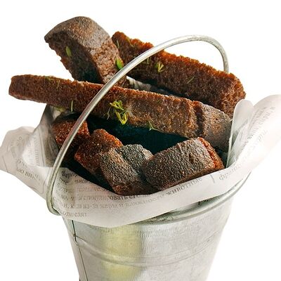 Гренки бородинские чесночныев Мидийная по цене 210 ₽