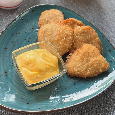 Наггетсы + сырный соус в Кафе Это Факт по цене 385 ₽