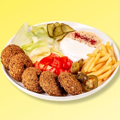Фалафель на тарелке в Shawafel по цене 469 ₽