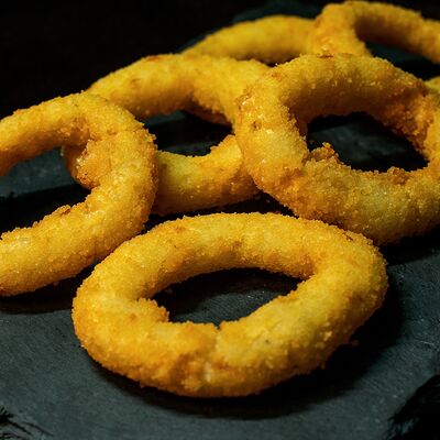 Луковые кольца (12 шт) в Крылышки Джо по цене 431 ₽