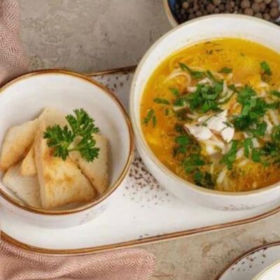 Куриный суп с домашней лапшой в Добрый Грузин по цене 570 ₽