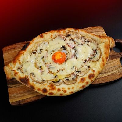 Хачапури по-Аджарски с ветчиной и грибами в Шава Банда по цене 1300 ₽