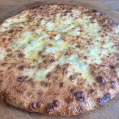 Осетинский пирог со свининой и говядиной в Чабрец по цене 1550 ₽