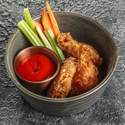 Куриные крылья Криспи в Кухня По Соседству по цене 470 ₽