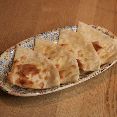 Лепешка в DVOR гриль-бистро по цене 120 ₽