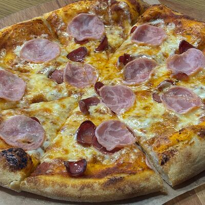 Мини-пицца мясная в La vino по цене 660 ₽