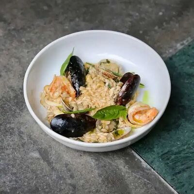 Ризотто с морепродуктами в Tin по цене 1250 ₽
