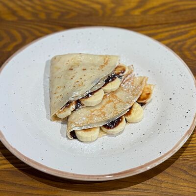 Блины с бананом и шоколадом в Хосперкафе бульвар по цене 300 ₽